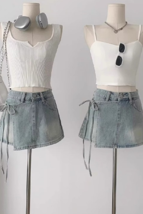 Close up of denim short skirt